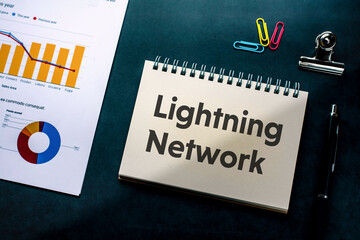 There is notebook with the word Lightning Network. It is as an eye-catching image.