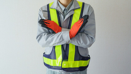 NGポーズ・作業服の男性・建設業イメージ