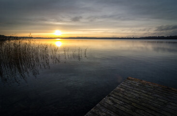 Autumn sunrise over the Swedish lake - 693244074