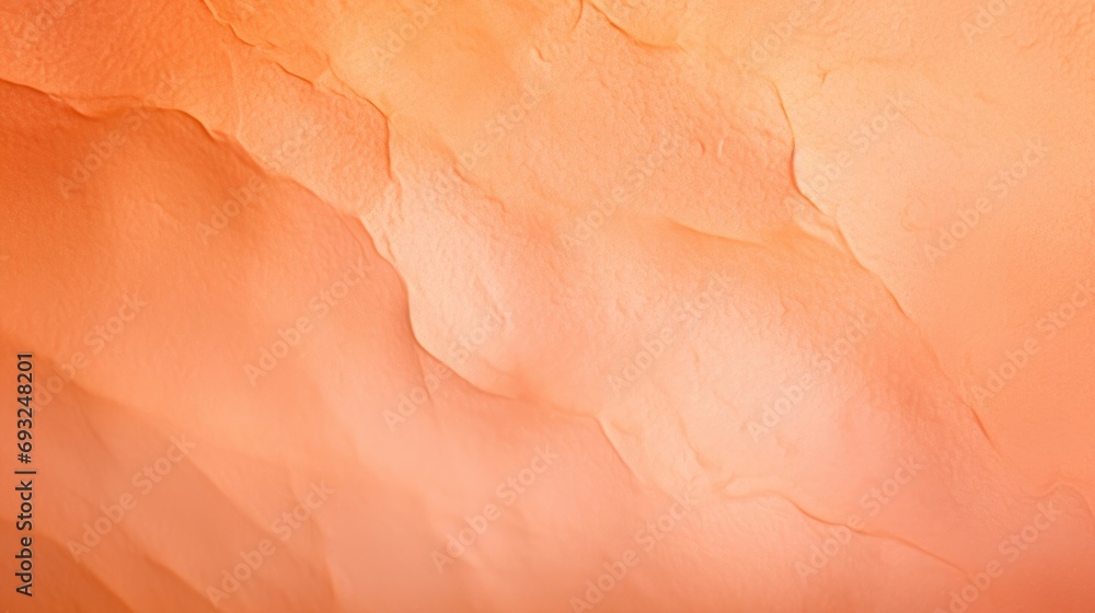 Poster Closeup of a Peach Fuzz colored backdrop featuring a gradient effect with lighter and darker shades.