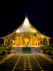 Wat Sirindhorn Wararam glowing temple in Ubon, Thailand
