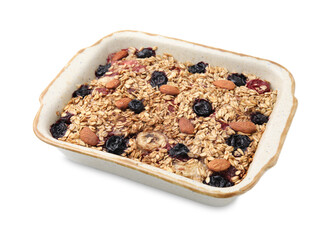 Tasty baked oatmeal with berries and almonds in baking tray isolated on white