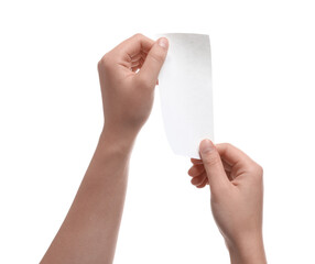 Woman holding piece of blank thermal paper for receipt on white background, closeup