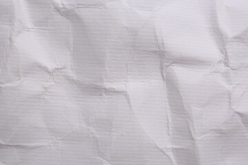 Texture of crumpled parchment paper as background, top view