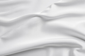 Naklejka premium Texture of white silk ripple fabric as background, top view