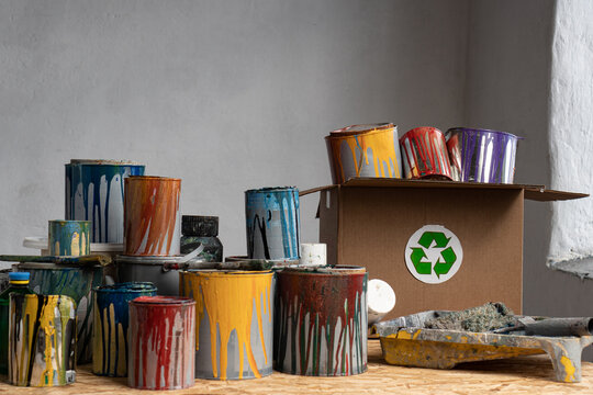 Empty paint cans. Paint Waste Management. Household Hazardous Waste - Paint Disposal