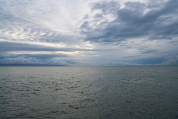 Fototapeta na wymiar Black Sea on the coast of Sochi against the sunset sky, Sochi, Krasnodar Krai, Russia