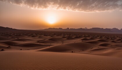 Fototapeta na wymiar A sunset over a desert landscape