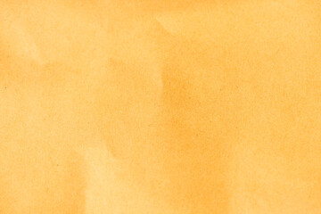 Crumpled brown paper. Yellow crumpled paper. Crumpled paper texture background. Clean brown paper. Yellow corrugated cardboard texture background. Brown paper cardboard with a soft color.