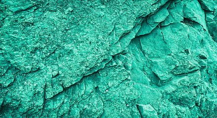 green rock texture. Toned rough mountain surface texture. 