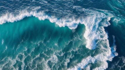 Fototapeta premium Waves in the sea. Aerial view of ocean waves. Top view from above. Drone photography. Beautiful seascape.