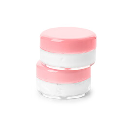 Jars of travel cosmetic product isolated on white background