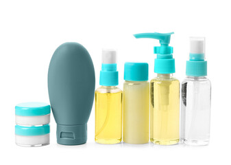 Set of travel cosmetic products isolated on white background