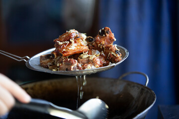 Fried pork in a pan. Thai style food, Thailand.