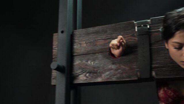 Spanking young alluring woman in wells for punishment
