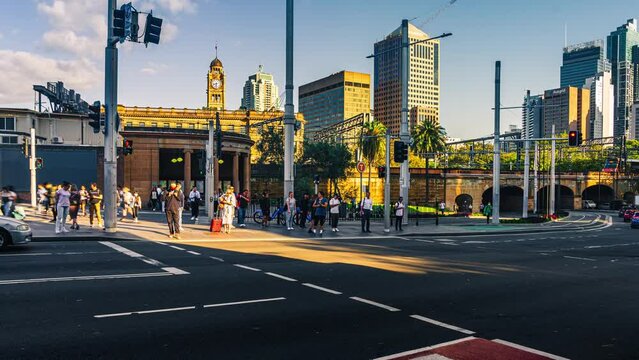 Crowded Commuter and Tourist walking and crossing road around central station in rush hour at the morning rush hour in Sydney