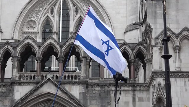 Israeli flag is flown infant of the Royal Courts of Justice in London, UK. 26.11.23