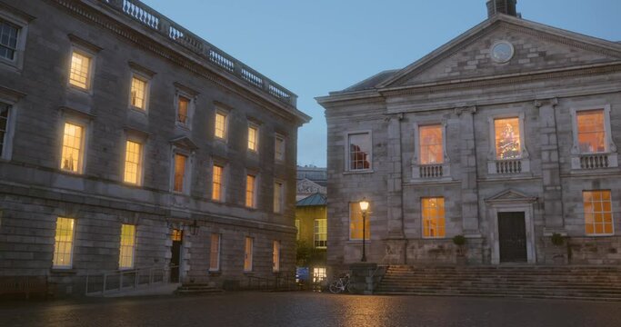Panning shot of Trinity College and University at Christmas in Dublin, Ireland.