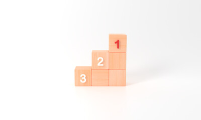 Fototapeta premium Business Task priority and management concept. The order of priority activity. Set work priority, arrange to do list. Wood cube blocks text number first, second, third.