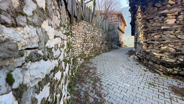 Side streets with historical stone buildings and sidewalks