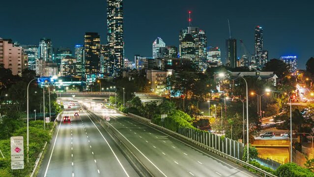 Time lapse Footage of Brisbane cityscape with expressway traffic road at the evening time after working hour, Queensland, Australia