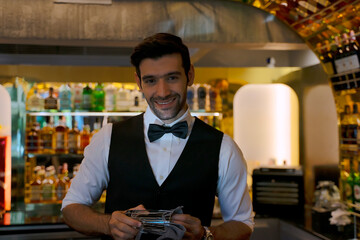 Bartender and customer at night club.