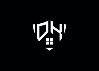 Real estate letter OK shield shape logo and house building vector template