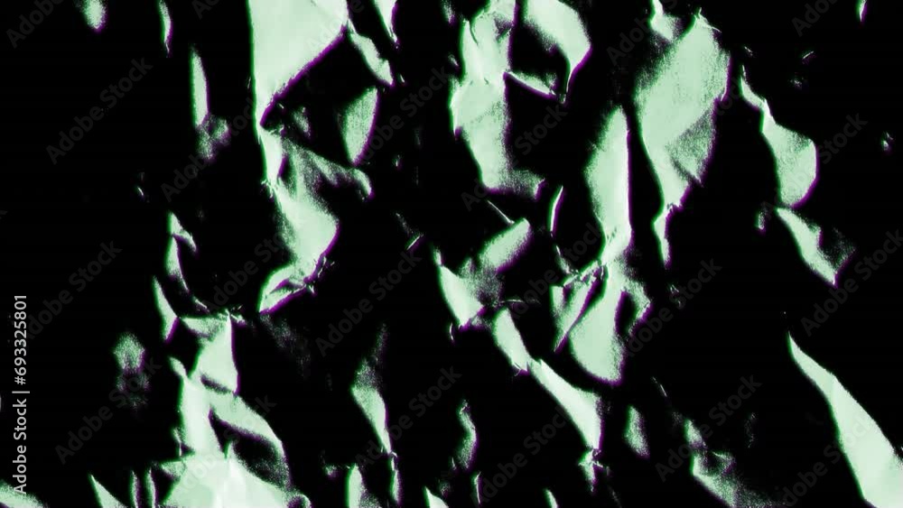 Aufkleber animation of moving and changing green texture and copy space on black background