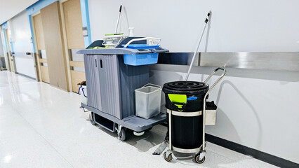 Cleaning Cart in the hospital. Cleaning tools cart and Garbage bin wait for cleaning. Bucket and...
