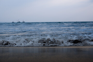 Fototapeta na wymiar waves on the beach, sea and sky, 