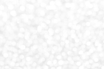 White and gray bokeh background. Photo can be used for the concepts of New Year, Christmas, Wedding Anniversary and all celebrations.