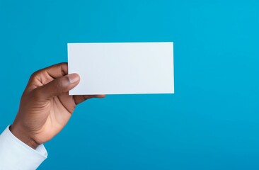 hand holding blank business card