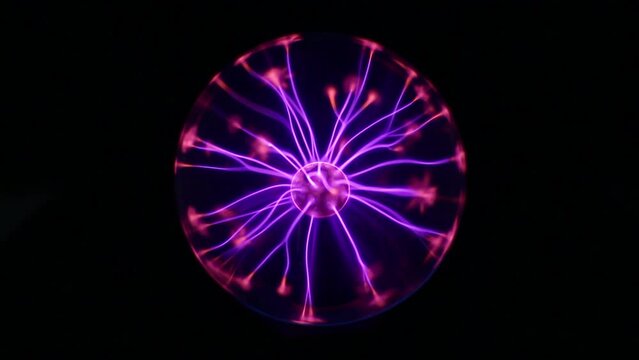 Lightning in a crystal ball. Plasma ball with multiple rays. Electric rays spinning inside a plasma ball. Cut out on black background
