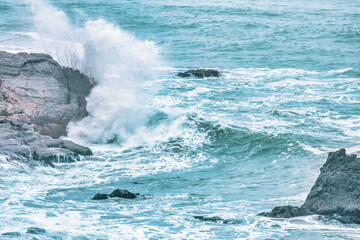 Wave splashing close-up. Crystal clear sea water, in the ocean in San Francisco Bay, blue water, pastel colors.