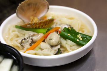 Korean food. Seafood kalguksu. Korean traditional noodle soup