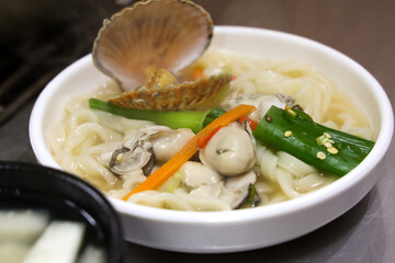 Korean food. Seafood kalguksu. Korean traditional noodle soup