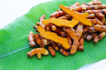 Turmeric roots on banana leaf