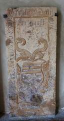 Vintage vertical gravestone. A carved stele and also with inscriptions on the outer edges.
