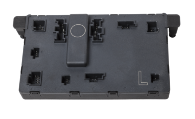 Plastic electronic control unit with black and blue connectors on a white isolated background in a photo studio. Spare part for sale or repair of car electronics in a car service.