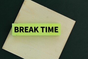 board and colored paper with the word break time. the concept of rest time