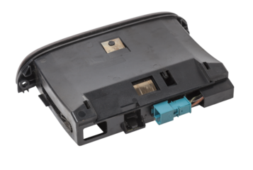 An ashtray from panel of car interior separately on a white isolated background with wooden decorative overlay.