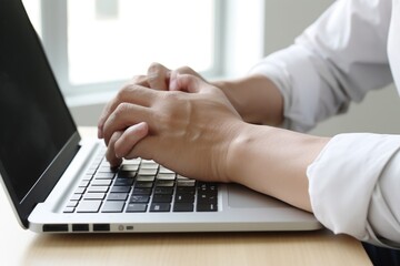 Person typing on a laptop. Suitable for technology or business-related content