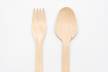 Wooden Cutlery, Eco Tableware, Disposable Cutlery, Recycle. Eco food packaging concept, zero waste paper, sustainability.