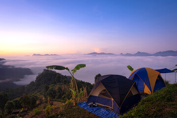 Beautiful natural scenery with a sea of mist on mountain peaks in the morning on the hills at Glo...