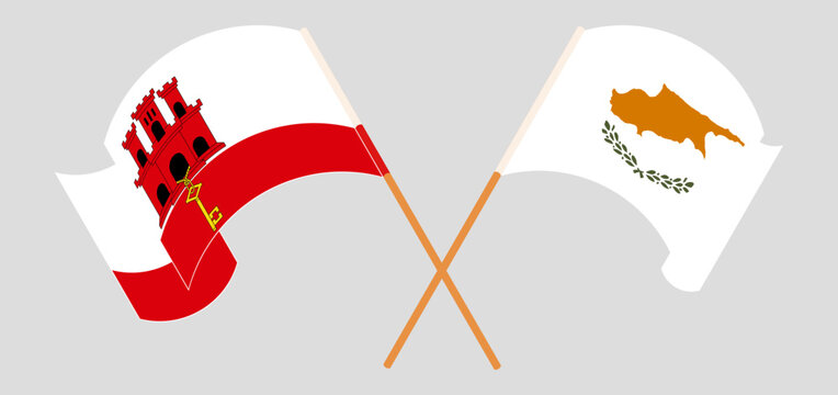 Crossed and waving flags of Gibraltar and Cyprus