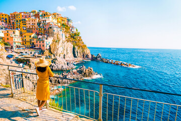 Asian women visiting Manarola in Cinque Terre Italy, Manarola Village Cinque Terre Coast Italy....