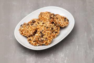 Healthy cookies with nuts and dry fruits on dish