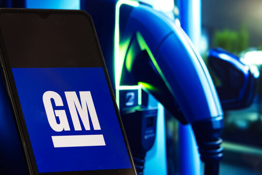 General Motors (GM) logo is displayed on a smartphone screen, Poland - December 15, 2023