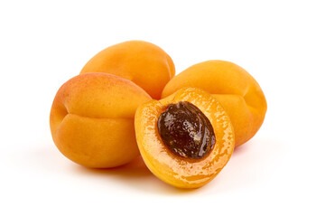 Isolated apricots. Fresh whole apricot fruit with half, isolated on white background.