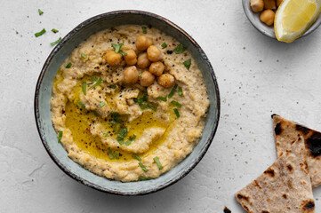Traditional hummus from chickpea. Spread. Assorted meze and dips with crispy pita. Middle eastern...